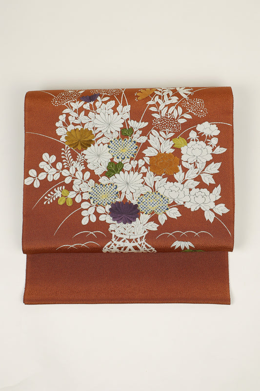 ぎをん齋藤の茶色の縮緬御所解帯のお太鼓の写真