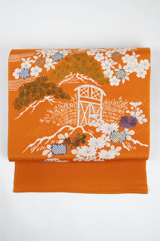 ぎをん齋藤の朱色縮緬御所解帯のお太鼓の写真