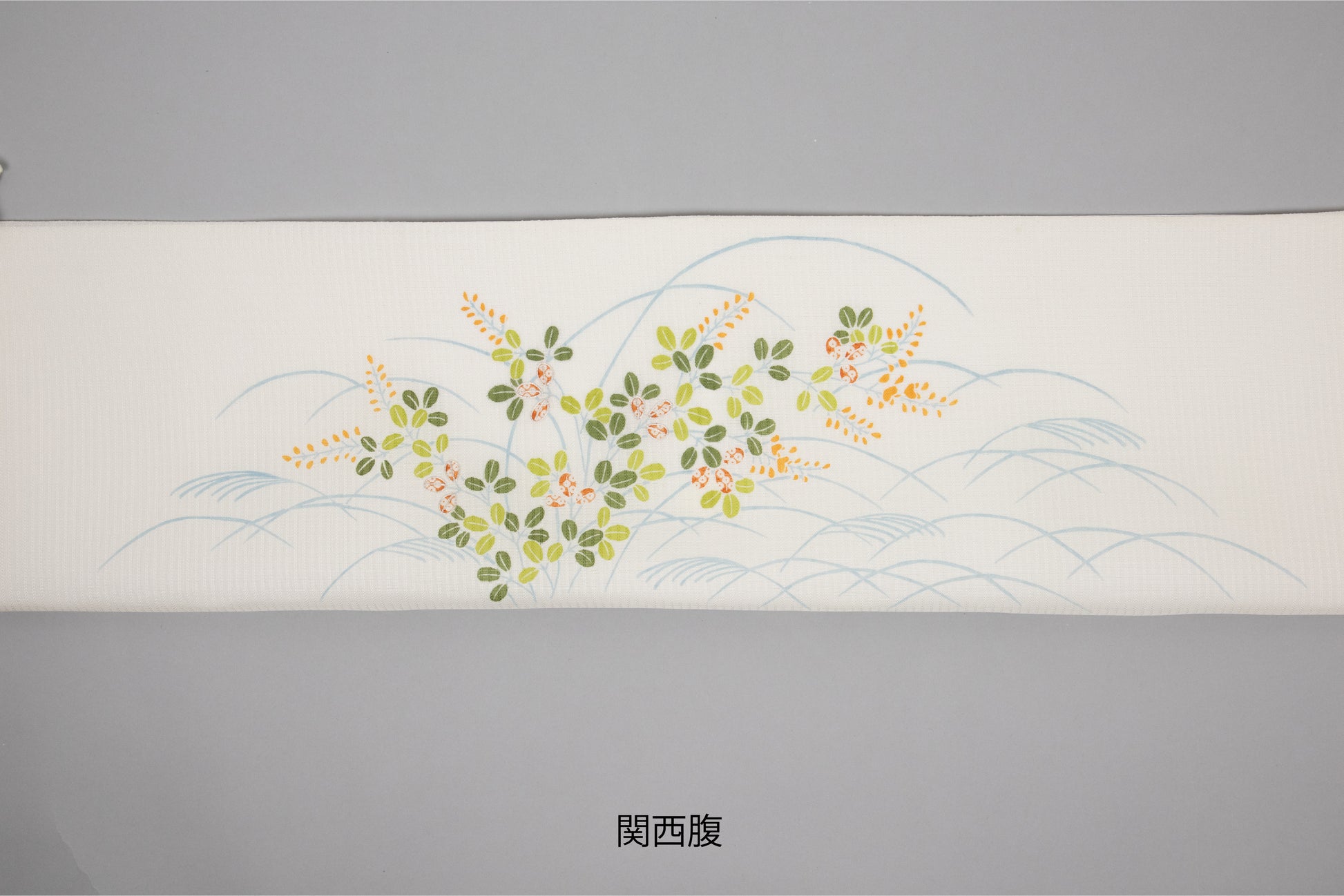 白色の夏紬の夏御所解帯の関西腹の写真