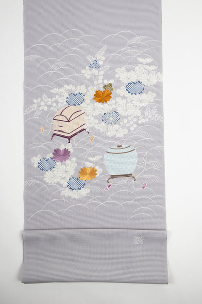 ぎをん齋藤の鼡色の駒絽夏御所解帯のお太鼓と落款の全体写真